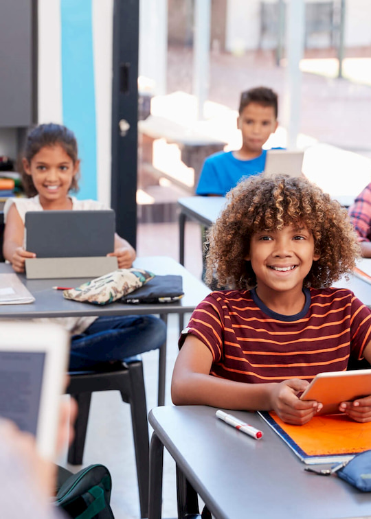 Motivated students at school playing quizzes